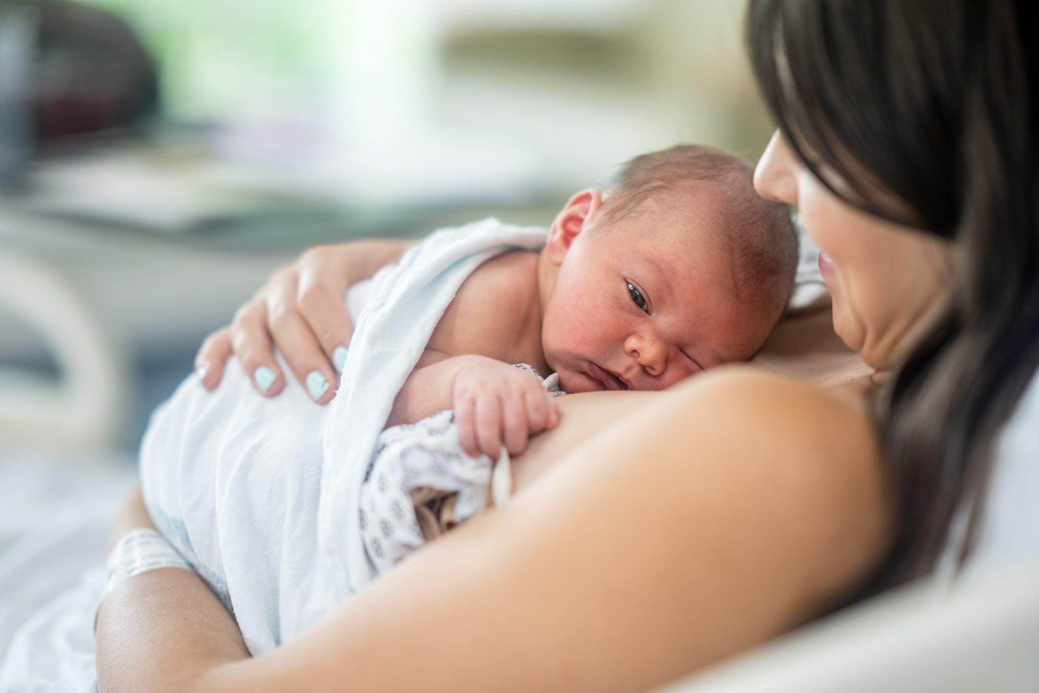 newborn baby on mom's chest